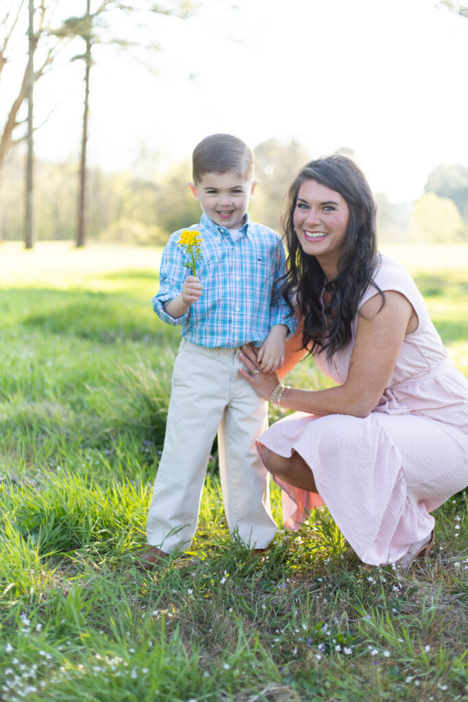 mom and little boy in spring outfits, posing for a photo in a field in hoover alabama